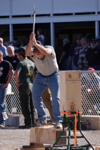 This event, called the Under Hand Chop, requires enormous hand-eye coordination!  The contestant stands on a solid wood block, and using his axe, must chop through the block between his feet with some very powerful swings without falling off the block or, G-d forbid, injuring himself in the process.  The winner chopped through the wood in less than 15 seconds.